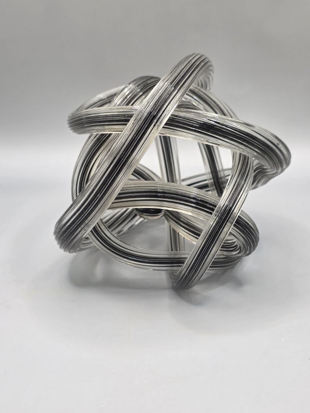 Hand Blown Art Glass Infinity Knot Sculpture Black White Ribbon Striped Loop 6"